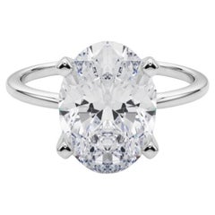 GIA 5.01ct Oval Slim Band Prong Set Solitaire 18K White Gold Diamond Ring