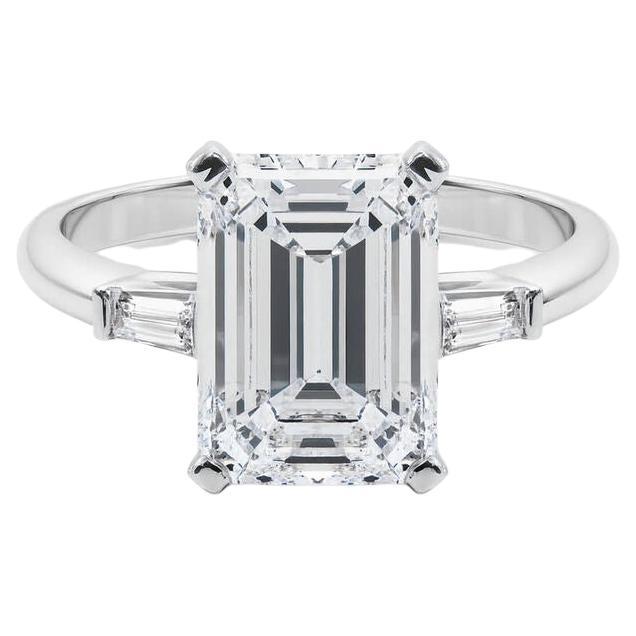 GIA 5.03ct Emerald Three-Stone Tapered Baguette 18K White Gold Diamond Ring For Sale