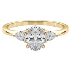 GIA Certified 1.5 Carat Oval 
Pear Three-Stone 18K Yellow Gold Diamond Ring