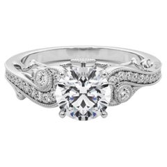 GIA 1.14 Carat Round Three-Stone Curved Bypass (contournement de trois pierres rondes)  Bague en diamant