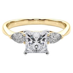 Anello con diamante a tre pietre Princess East-West certificato GIA da 0.8 carati