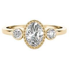 GIA 1 Carat Oval Textured Bezel Three-Stone 18K Yellow Gold Diamond Ring