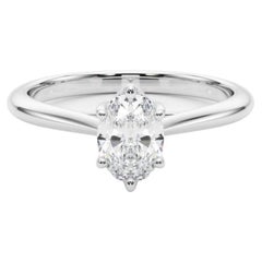 Anillo de diamantes de platino rosa con solitario oval de 1.7 quilates certificado por el GIA