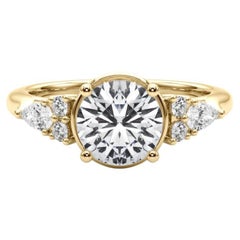 GIA 1,2ct Anello con diamante rotondo a castone e fiore incastonato in oro giallo