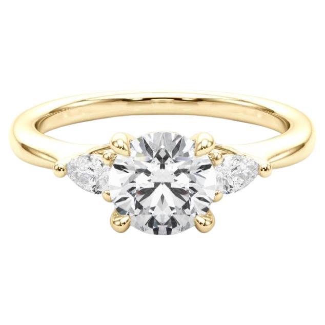 GIA Certified 1.3 Carat Round 
Pear Three-Stone 18K Yellow Gold Diamond Ring For Sale