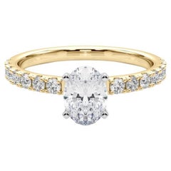 GIA 1,2ct Solitario ovale con mezza eternità in oro giallo 18 carati