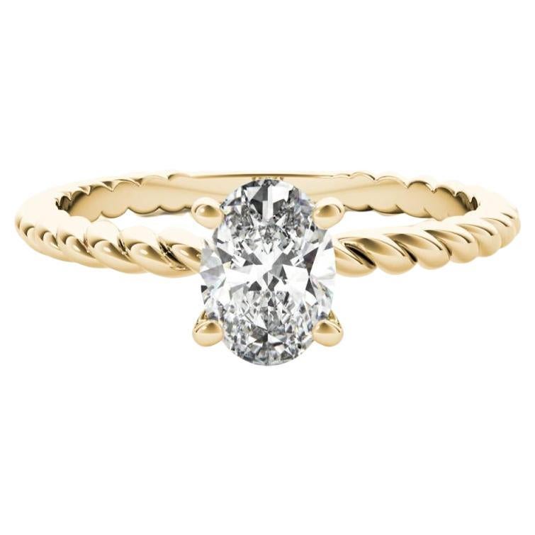 Anillo de diamantes solitario ovalado con banda trenzada de 0,9 quilates certificado por el GIA