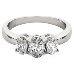 GIA Certified 1.31 Carat Three-Stone Oval  Diamond Ring