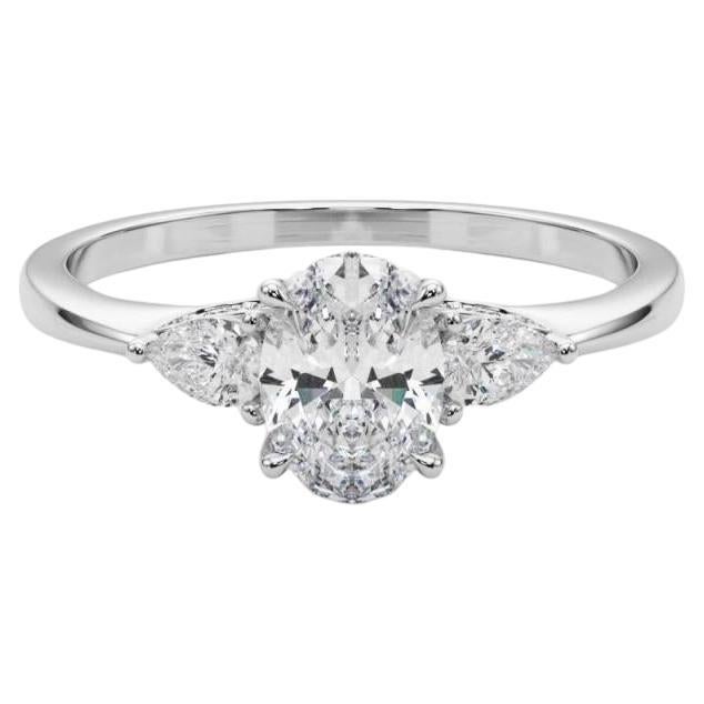 GIA Certified 1 Carat Oval 
Pear Three-Stone  Diamond Ring