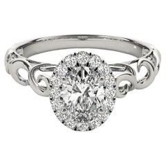 GIA Certified 0.82 Carat Oval Halo Ribbon Cathedral Diamond Ring