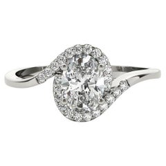 GIA Certified 0.8 Carat Oval Halo Curved Bypass Shank Platinum Diamond Ring