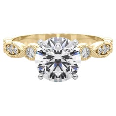 GIA Bague en or jaune avec chaton en forme de marquise et de milgrain d
une valeur de 1ct