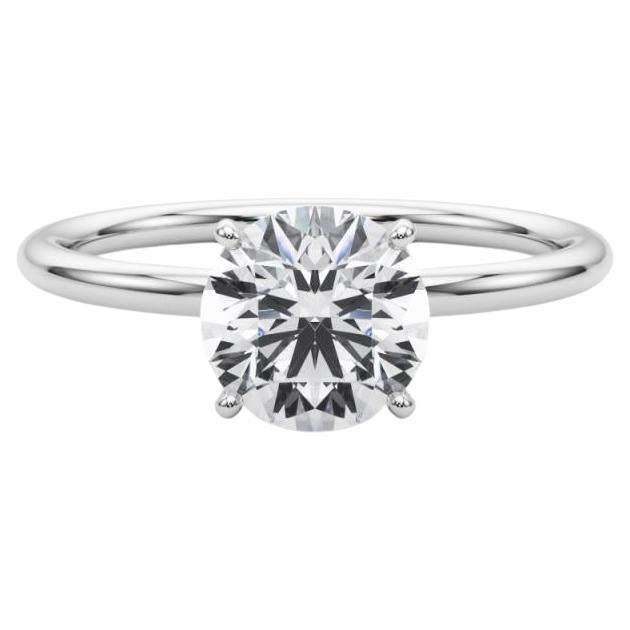 Bague à diamant en platine certifiée GIA de 1.51 carat avec halo caché et solitaire rond