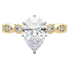 GIA 1.51ct Pear Marquise e Round Milgrain Bezel Anello con diamanti in oro giallo