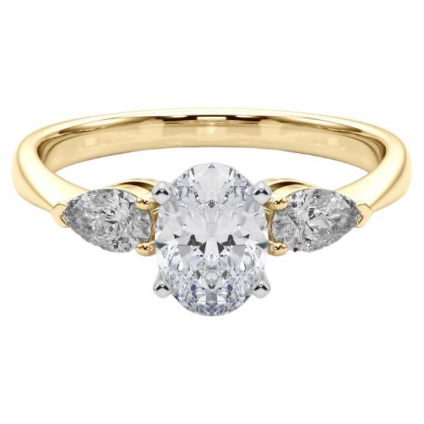 Bague à trois pierres en diamant ovale est-ouest de 1.2 carat certifiée par le GIA