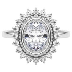 GIA Certified 2.51 Carat Oval Cluster Vintage Flower Platinum Diamond Ring