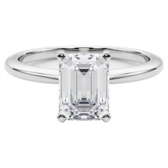 Anillo de diamantes solitario con esmeralda de 1.5 quilates, certificado por el GIA