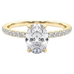 Anillo de diamantes de oro amarillo de 18 quilates con halo oculto ovalado de 1,2 quilates certificado por GIA