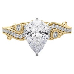 GIA 2.01 Carat Pear Three-Stone Curved Bypass 18K Yellow Gold Diamond Ring