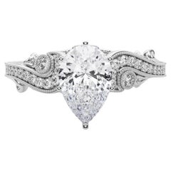 GIA 1.2 Carat Pear Three-Stone Curved Bypass  Diamond Ring