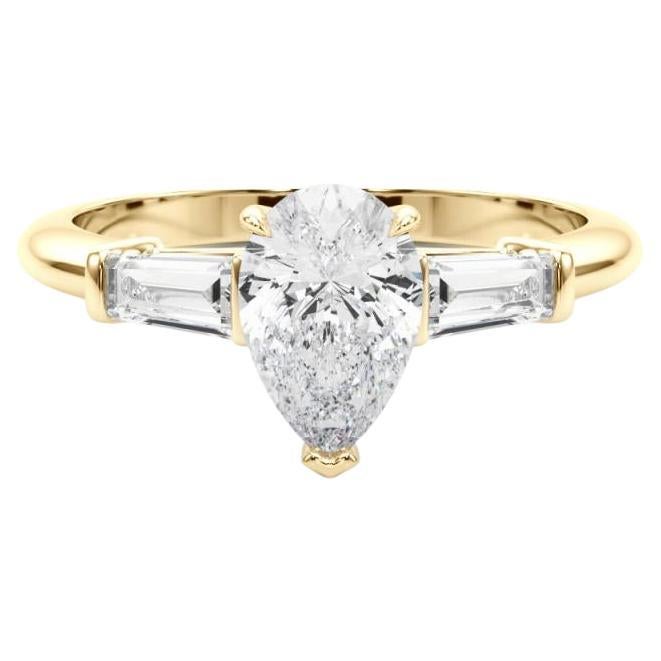 GIA Certified 1.71 Carat Pear 
Baguette Three-Stone Diamond Ring