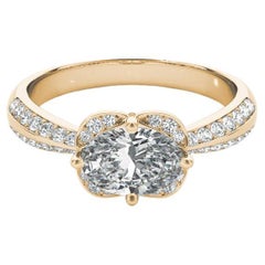 Bague à diamants certifiée GIA de 1.4 carat avec halo ovale est-ouest et double pavage