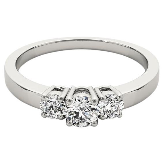 Anello con diamante brillante rotondo certificato GIA da 2.2 carati e tre pietre