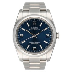 Rolex Oyster Perpetual 116000 blaues Zifferblatt Stahl Herrenuhr Box Papiere