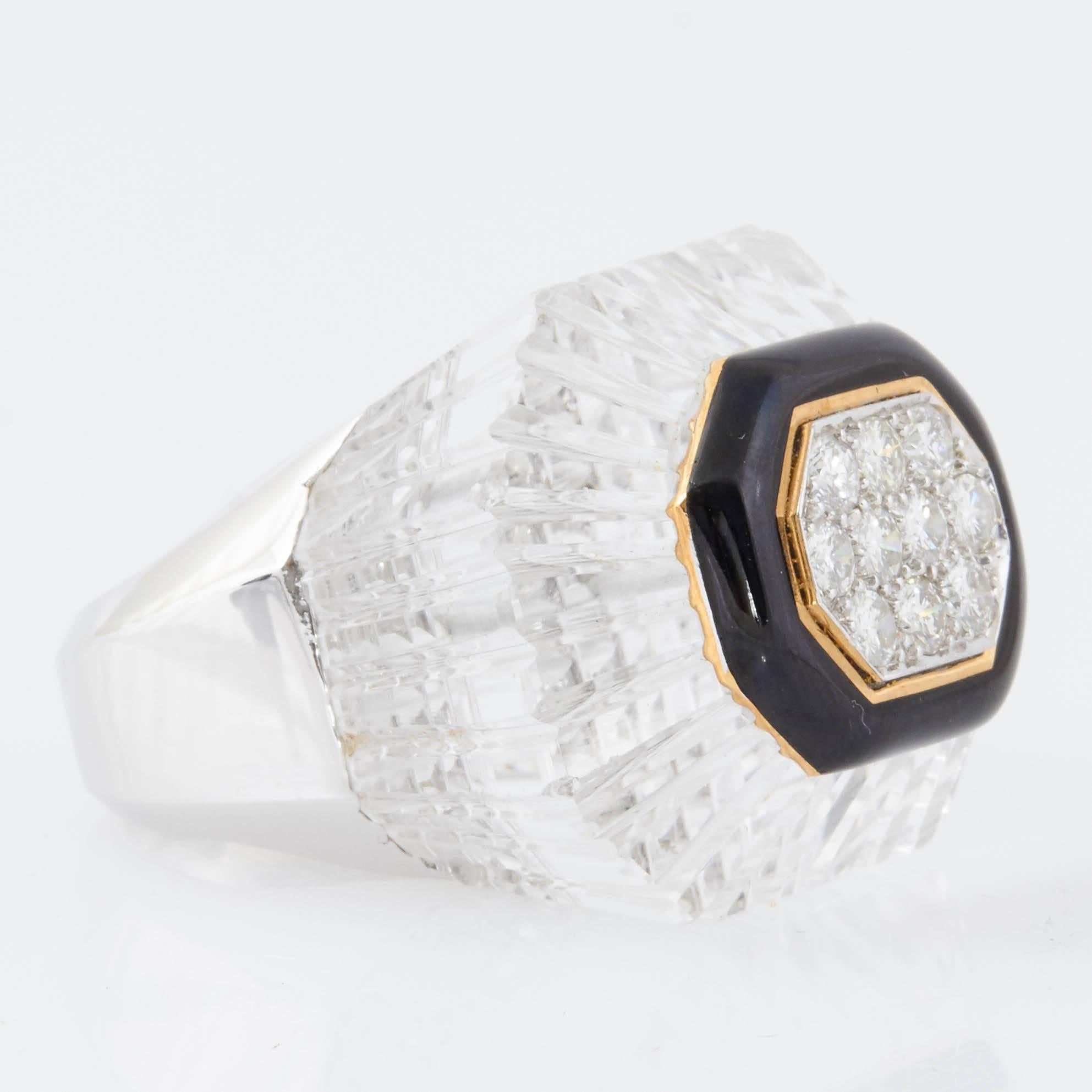 Signed David Webb Rock Crystal ring features 2.00 carats of round cut diamonds at the center. 