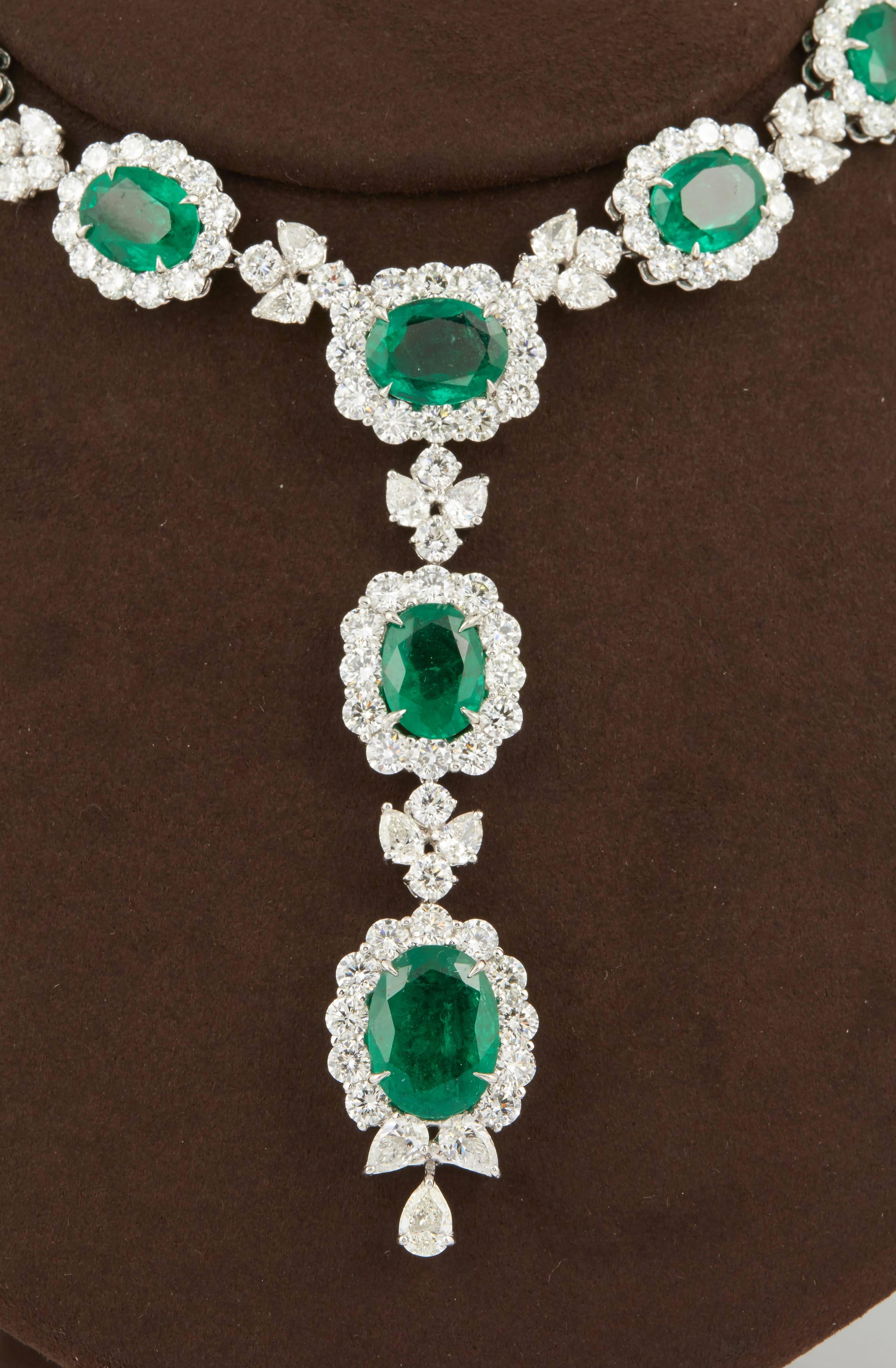 

An incredible necklace featuring high quality fine green emeralds complimented by white diamonds. 

59.50 carats of green emeralds

50.74 carats of F/G VS diamonds

Platinum

Approximately 17 inch neck size that can be adjusted if necessary. The