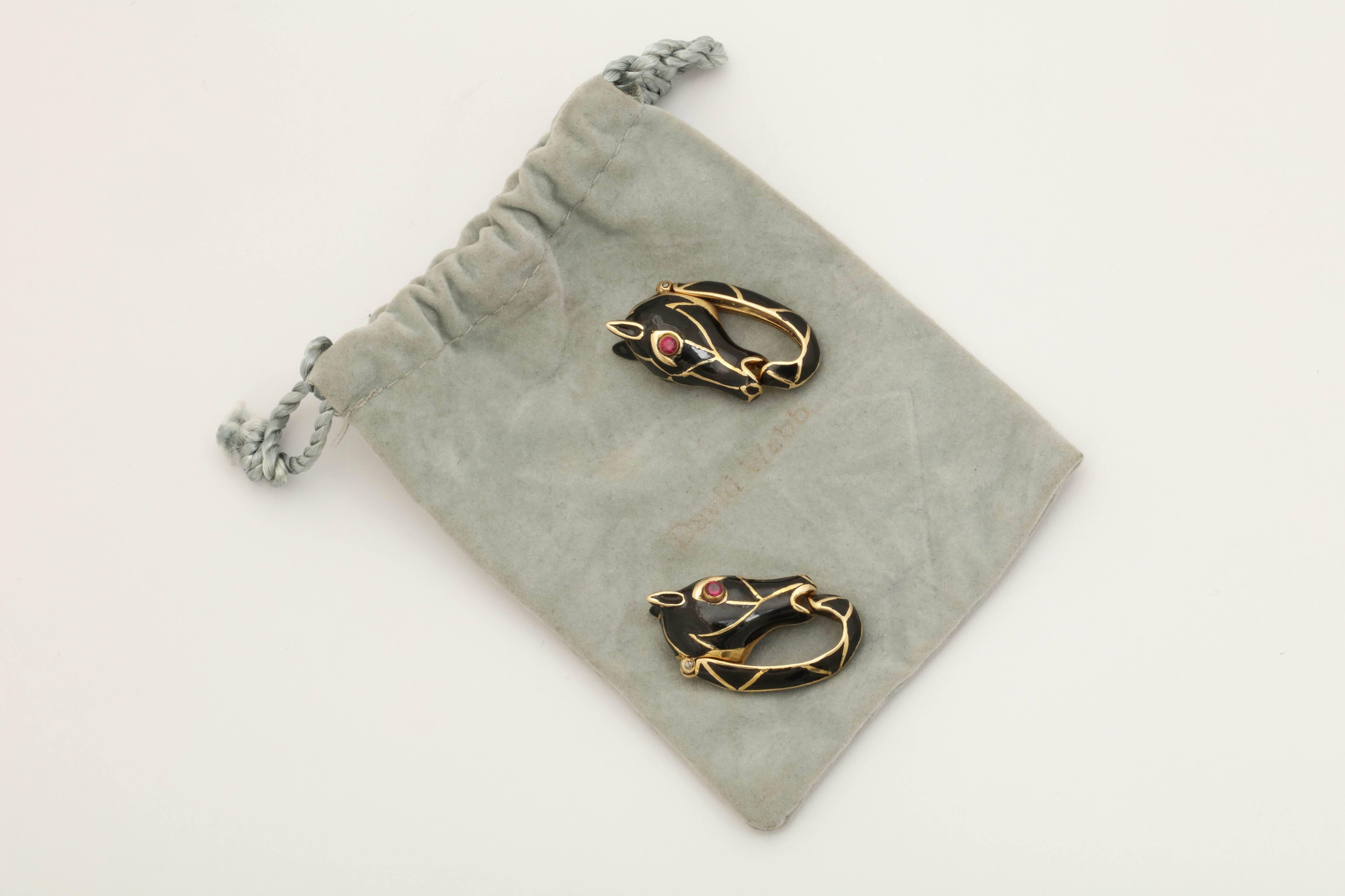 One Pair Of Gentlemen's Black Steel Enamel Hematite Color Horse Cufflinks Created By David Webb In The 1960's. Note Rubies For Horses Eyes.Created In 18kt Yellow Gold.
