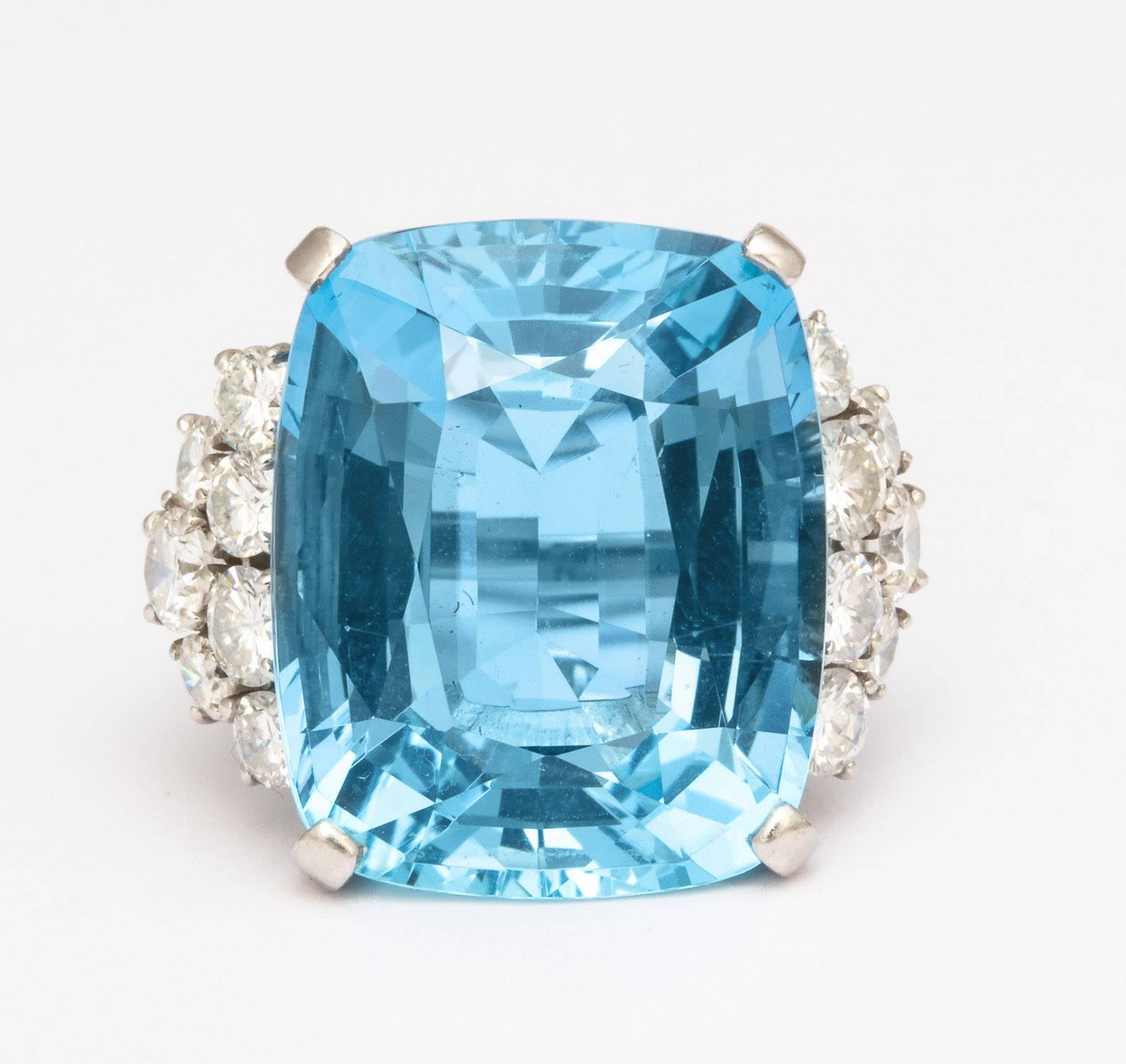 Spectacular color Aqua Marine 28.35 carats
14 Round Brilliant Cut diamonds  4.00 carats

Handmade Platinum Mounting

circa 1940