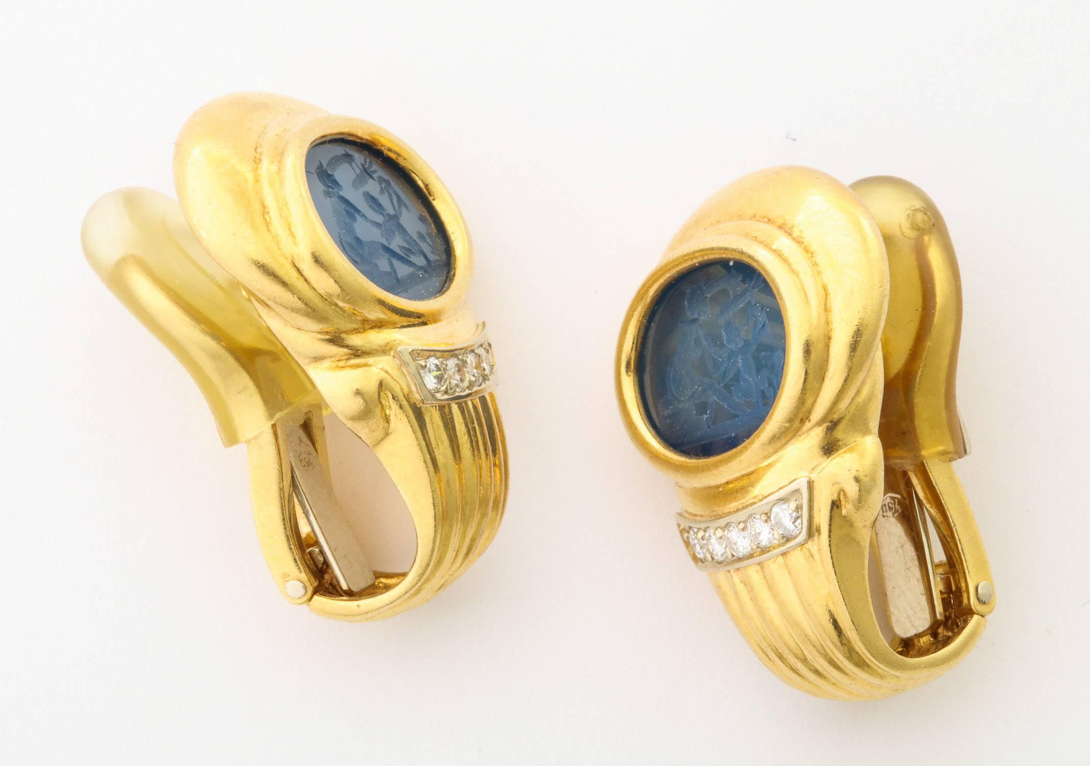 18k yellow gold blue agate intaglio earrings with diamonds containing 10 full cut diamonds approximate total weight0.25 ct.