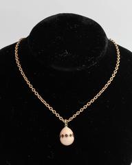 Russian Imperial-era Enameled and Ruby Egg Pendant, circa 1900