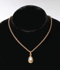Rare Russian Textured Gold and Star Sapphire Egg Pendant, circa 1900