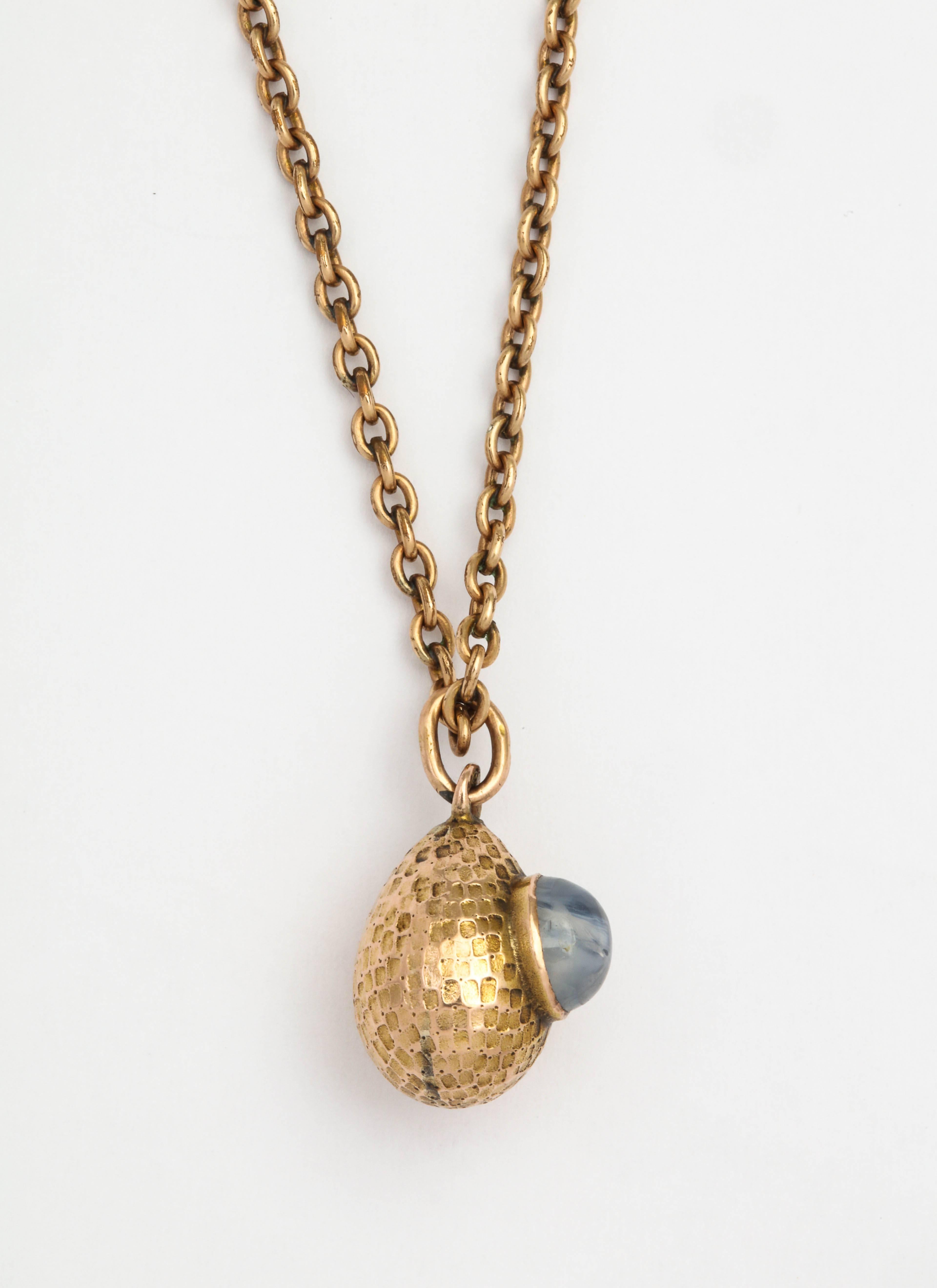 Women's or Men's Rare Russian Textured Gold and Star Sapphire Egg Pendant, circa 1900