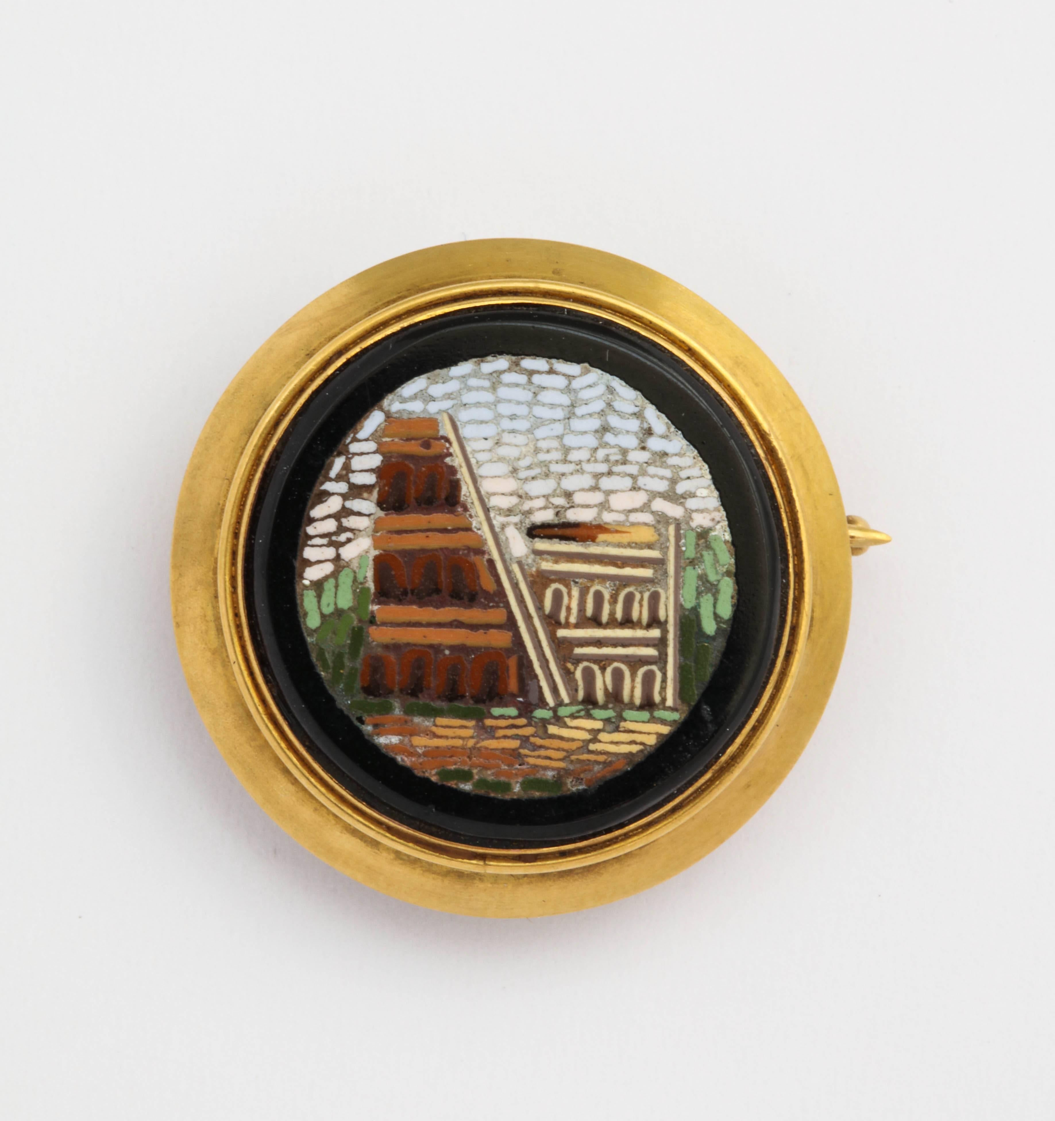 Russian pin/pendant from the Romanov era, period of Tsar Alexander III, depicting a Roman ruin, this 19th century Italian micro-mosaic memento of a Grand Tour, was mounted as a gold brooch by Nicholls & Plincke of St. Petersburg. Within a smooth