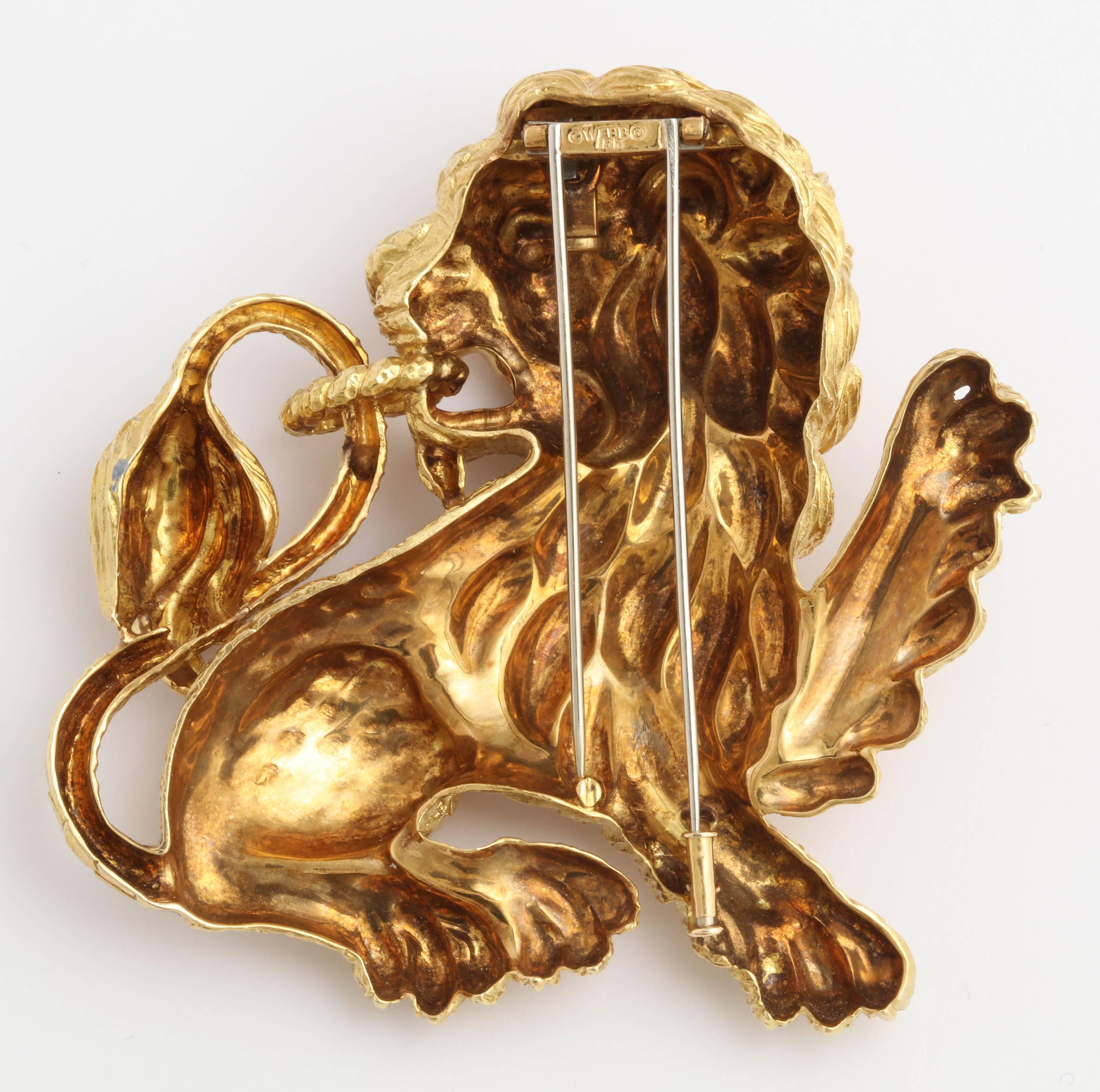 18kt Yellow Gold "Foo Dog" Pendant - Brooch with textured and engraved finish.   Signed    ( C Webb - 18k R).   Has a push up U  shaped fitting to be used to attach to a Period  ( now missing ) David Webb chain. and a double Pin on hinge