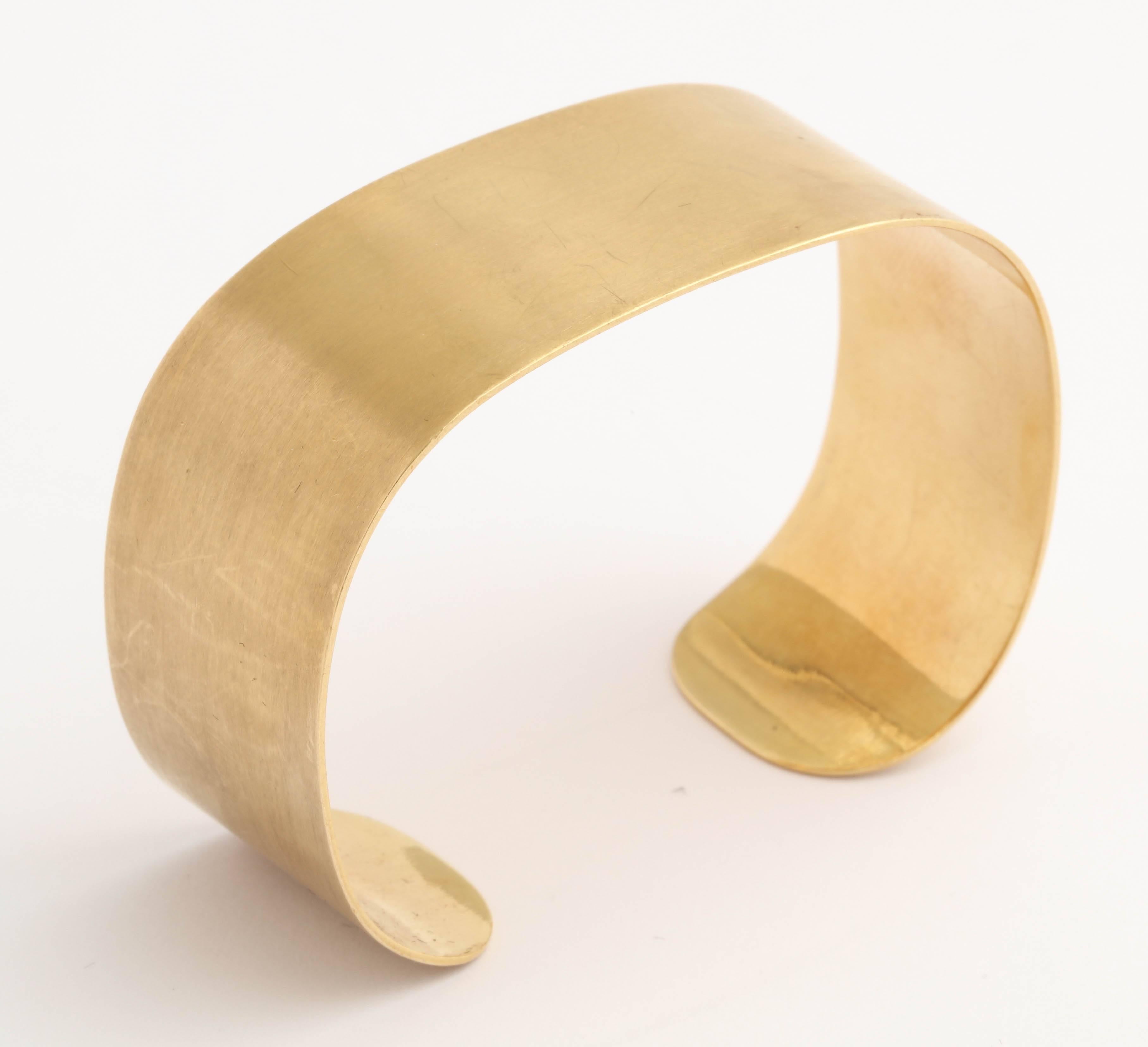 Vintage Dinh Van C shaped cuff Bracelet made for Cartier around 1960-1965 with a brushed satin finish.  Signed Cartier 18Kt  on one end and C -  Dinh Van on the other end. Inner measurement 2 1/4" x 11 3/4"  So cool.