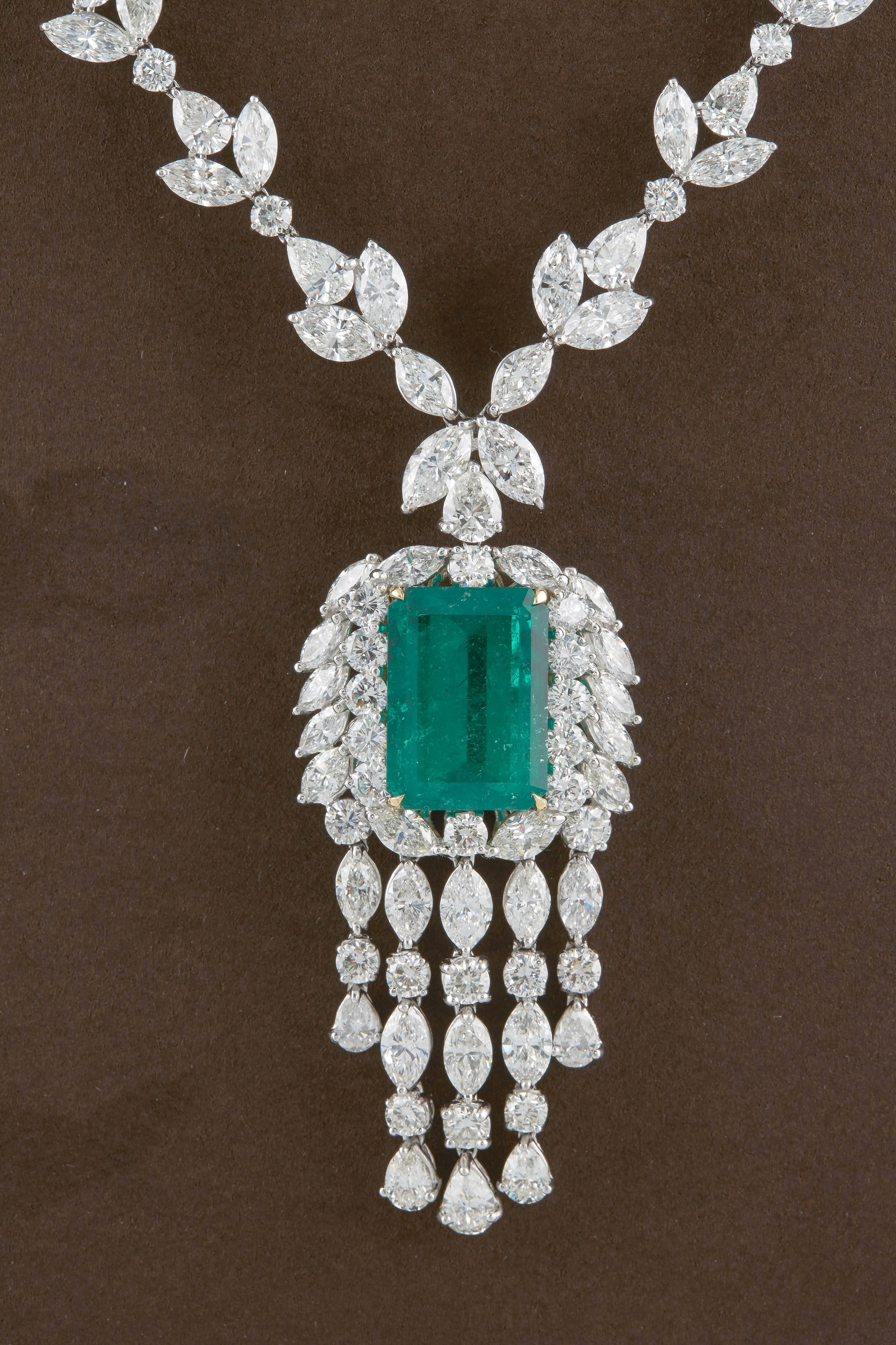 

A gorgeous Colombian Green Emerald set in a FABULOUS necklace!

20.98 carat GIA certified Colombian Green Emerald with beautiful color and luster. 

68.06 carats of F/G VS round, pear and marquise cut diamonds.

Made in New York and set in
