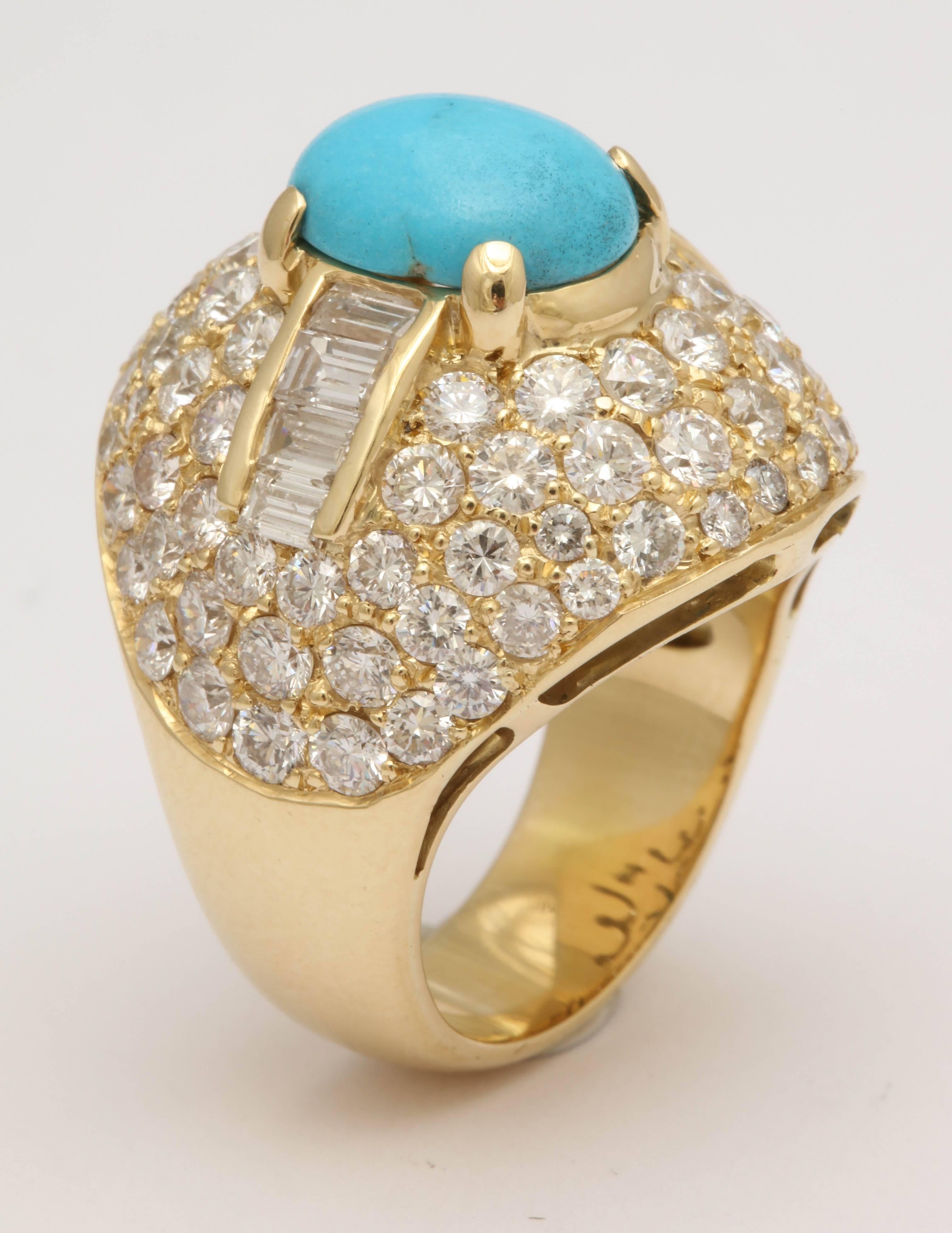 One Ladies fancy 18kt Yellow Gold Dome Ring Embellished with numerous High Quality Brilliant Cut diamonds Weighing Approximately 3.50 Cts And Flanked By Eight Baguette Cut Diamonds Weighing Approximately .50 Cts Total. Total diamond Weight