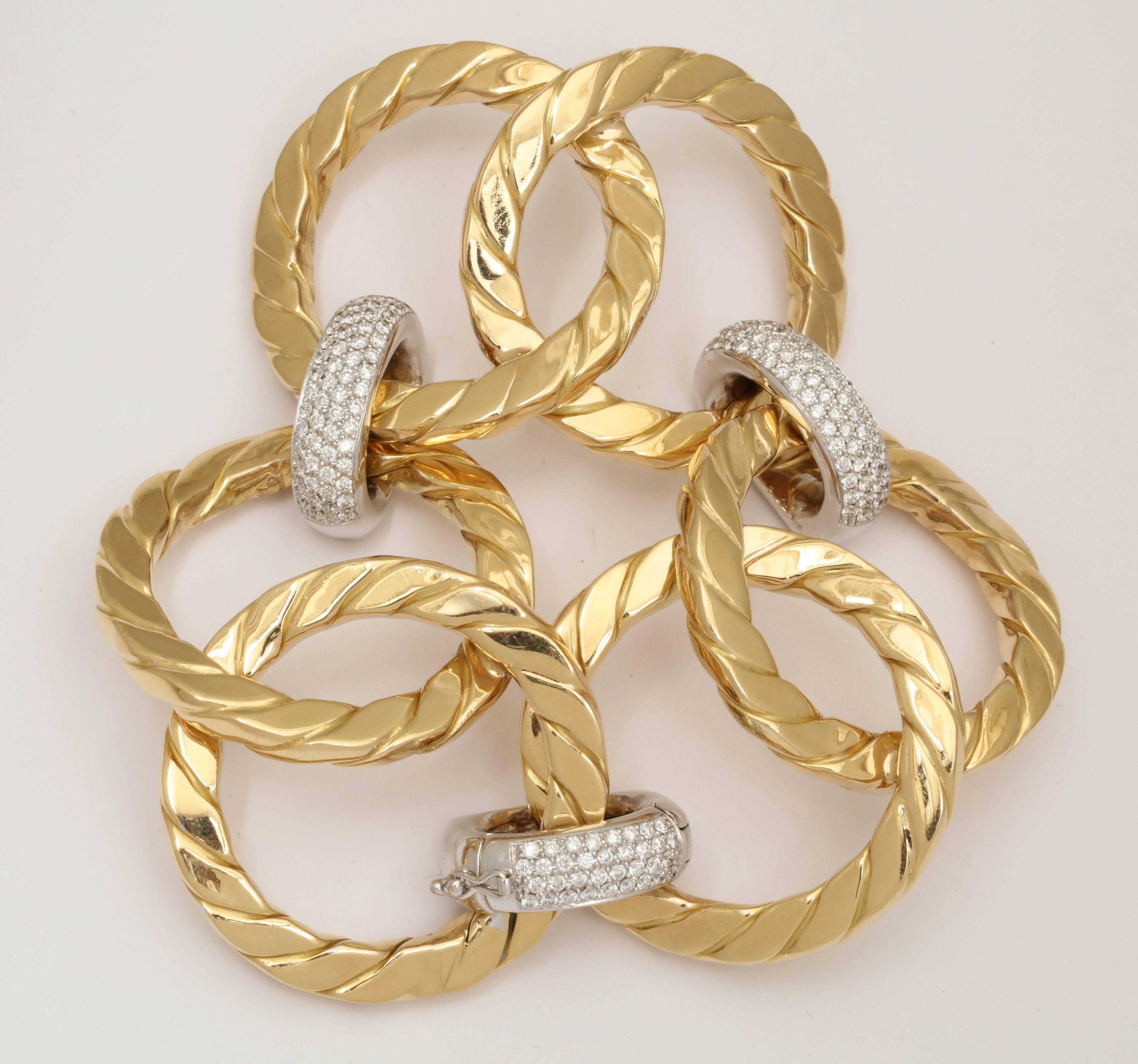 One Ladies 18kt Textured Yellow Gold Link Bracelet Designed In The 1990's By Nicolis Cola.Beautiful Large Dramatic Effect Embellished With 3 Carats Of High Quality Full Cut Diamonds. Very Flexibly Made With A Textured ,Ridged Gold Design.