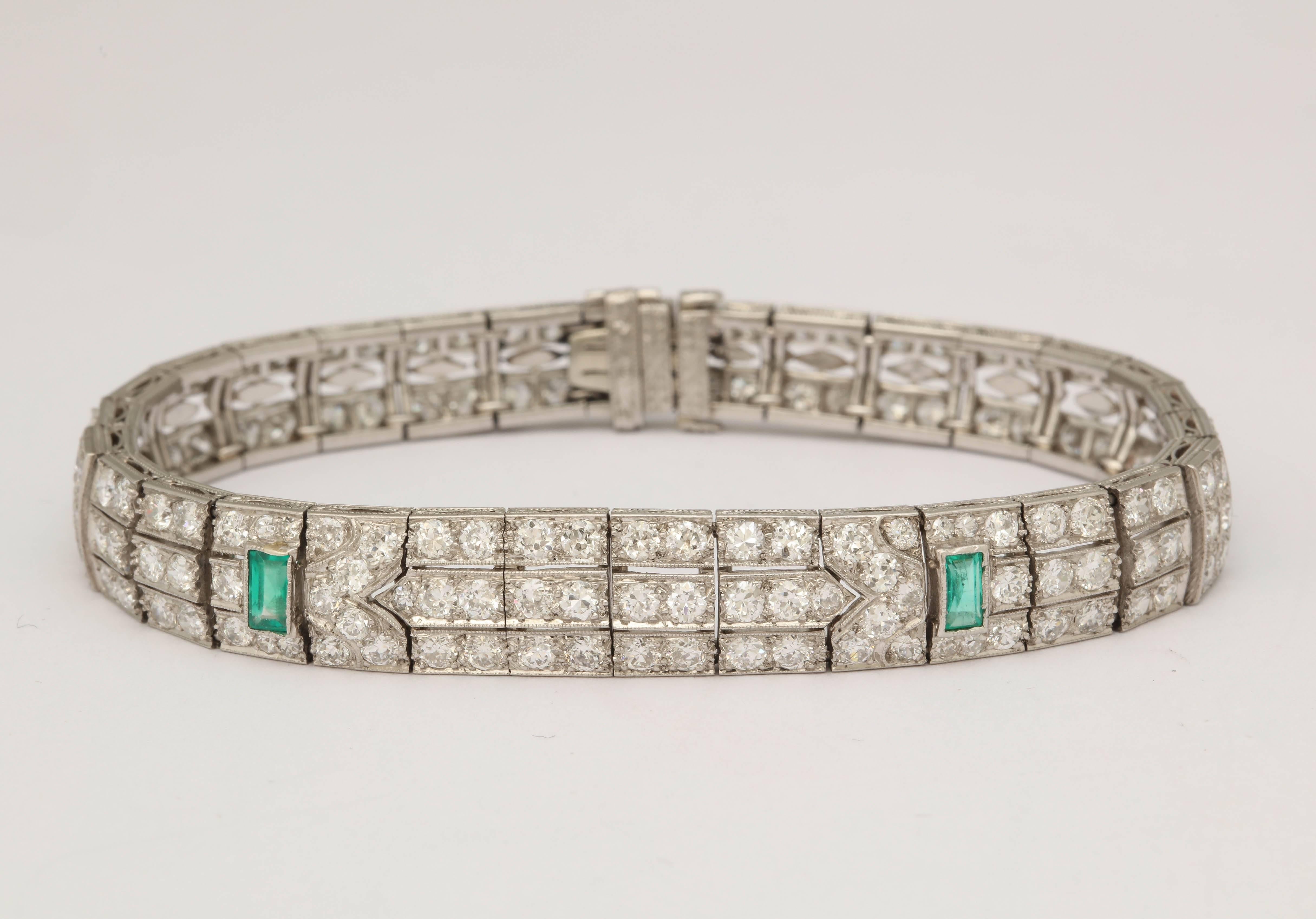 One Ladies Handmade Elegant Flexible Triple Straightline Bracelet Embellished With Numerous Antique Cut Diamonds Weighing Approximately 7 Carats total weight.. Further Designed With Eight Calibre Cut. Square Cut Beautiful Color Emeralds Weighing