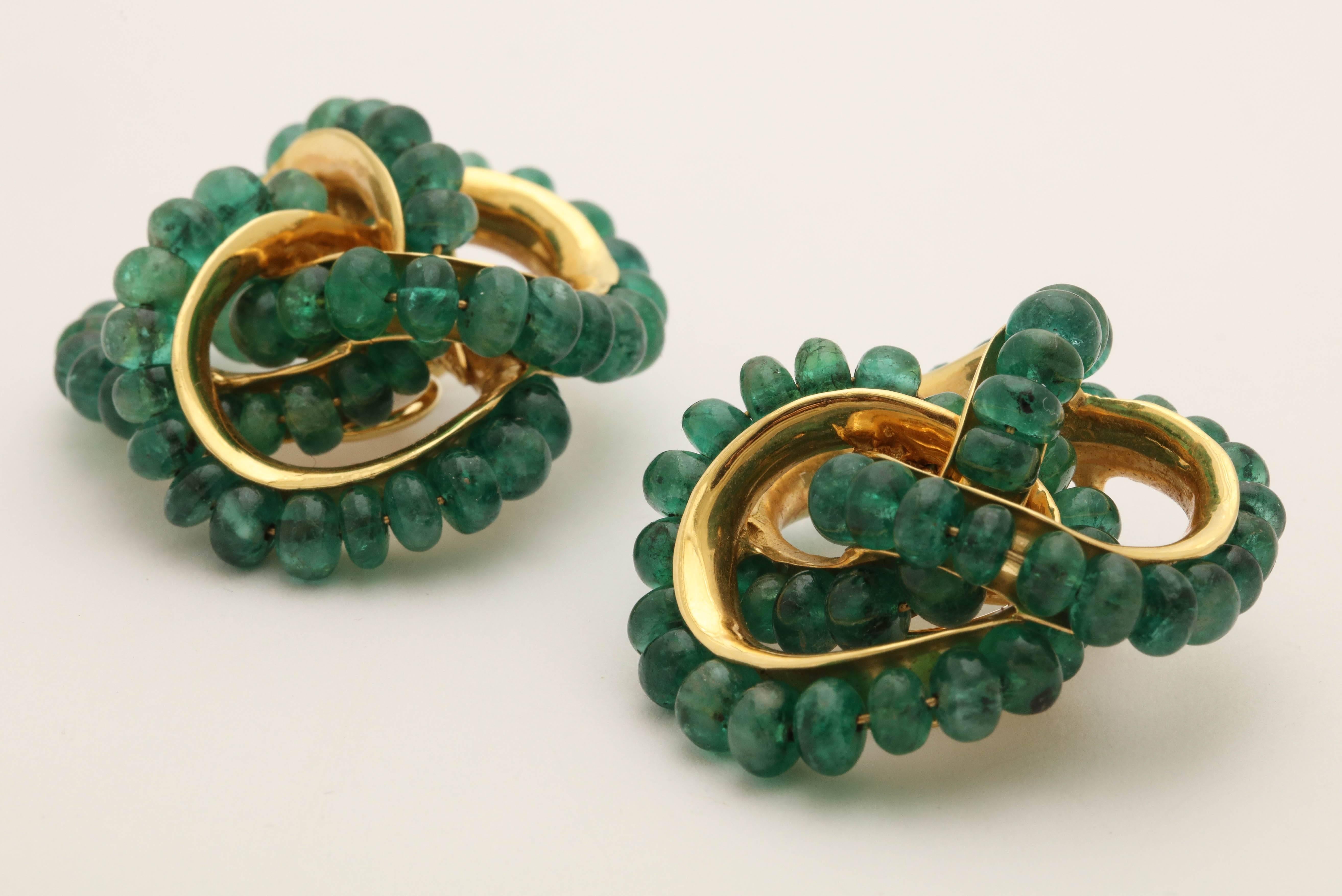 1980s Seaman Schepps Large Emerald Pretzel Knot Design Gold Clip-On Earrings 1
