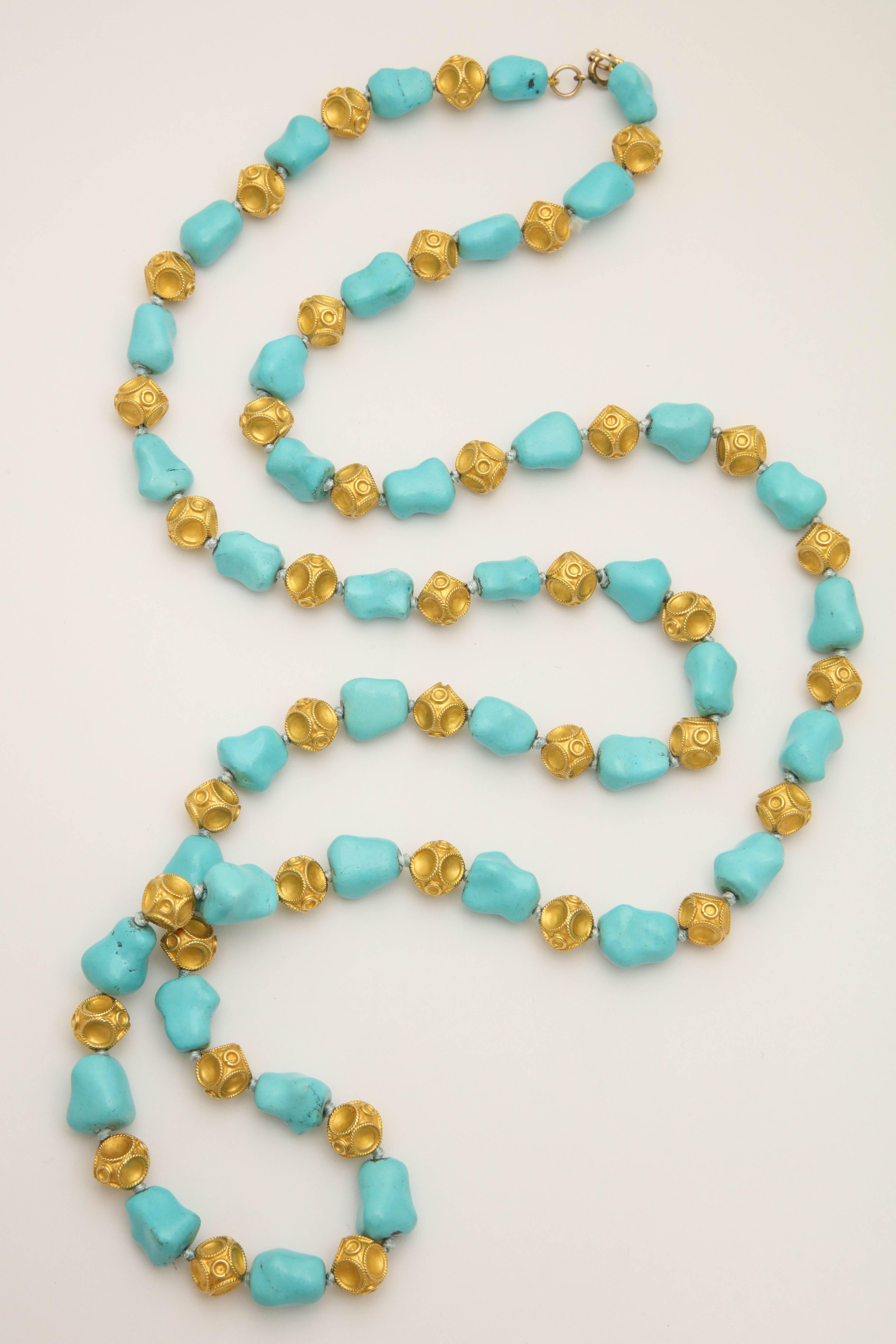 One 18kt Yellow Gold Alternating Turquoise Nugget Pieces With 18kt Yellow Gold Crater Design Ball Pieces To Form A 40 Inches Long Chain Necklace. Note: Necklace May Be Worn Doubled To Form Two 20 inch Necklace Length Chains.Easy To Open And Close