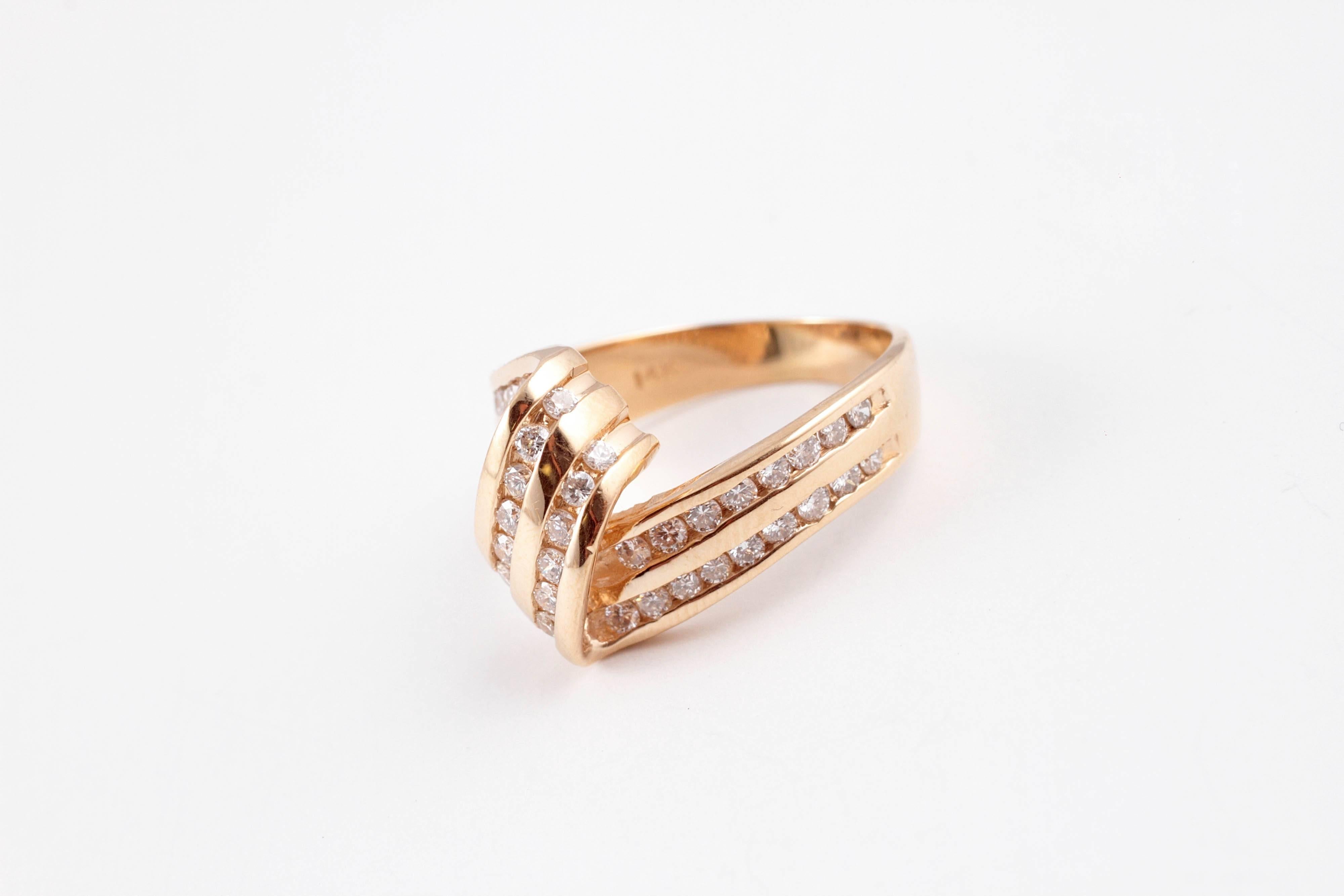 Fun and different - for any finger!  In 14 karat yellow gold, size 7 1/2. 