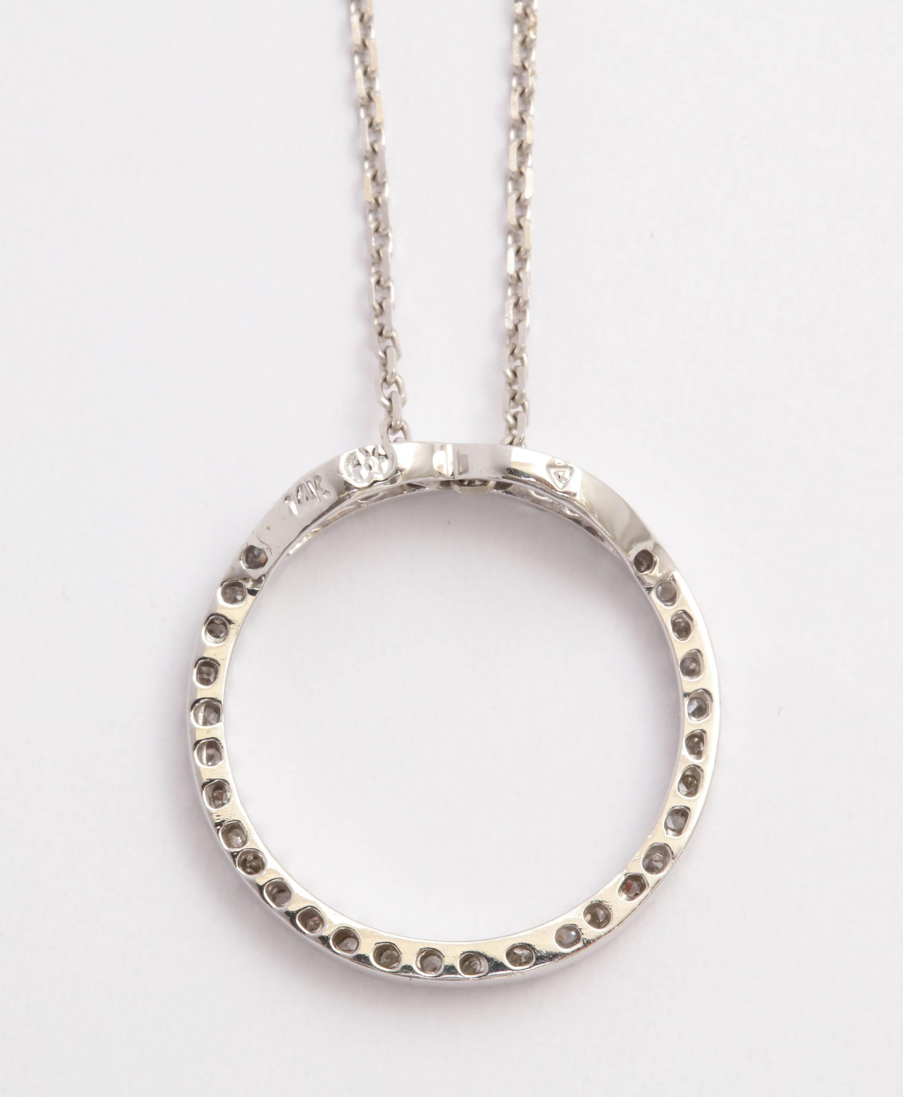 Contemporary Diamond and Gold Circle of Love Pendant For Sale