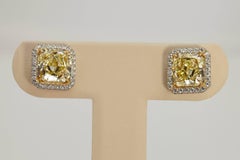 Radiant GIA Fancy Yellow Diamond Earrings 6.61 Carat