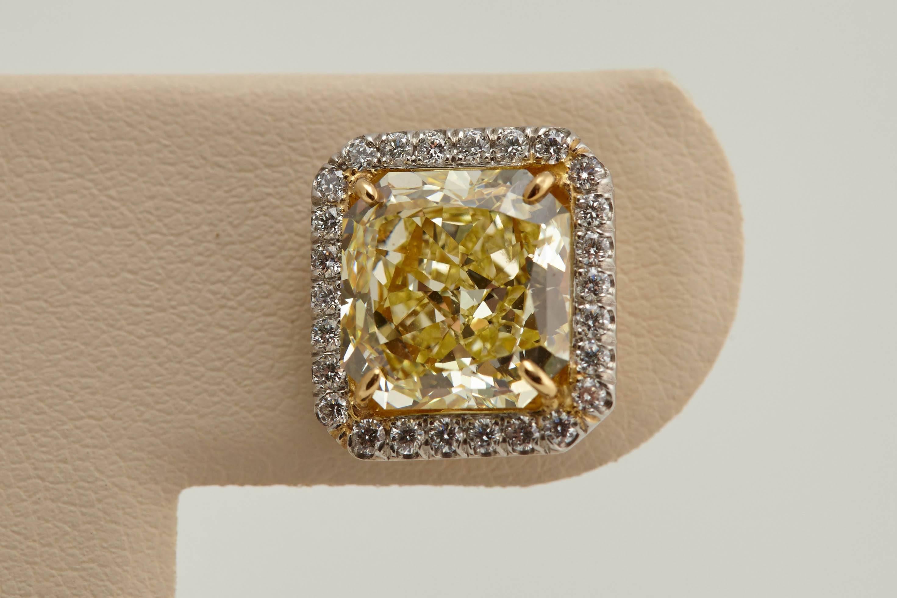 Radiant GIA Fancy Yellow Diamond Earrings 6.61 Carat For Sale 4
