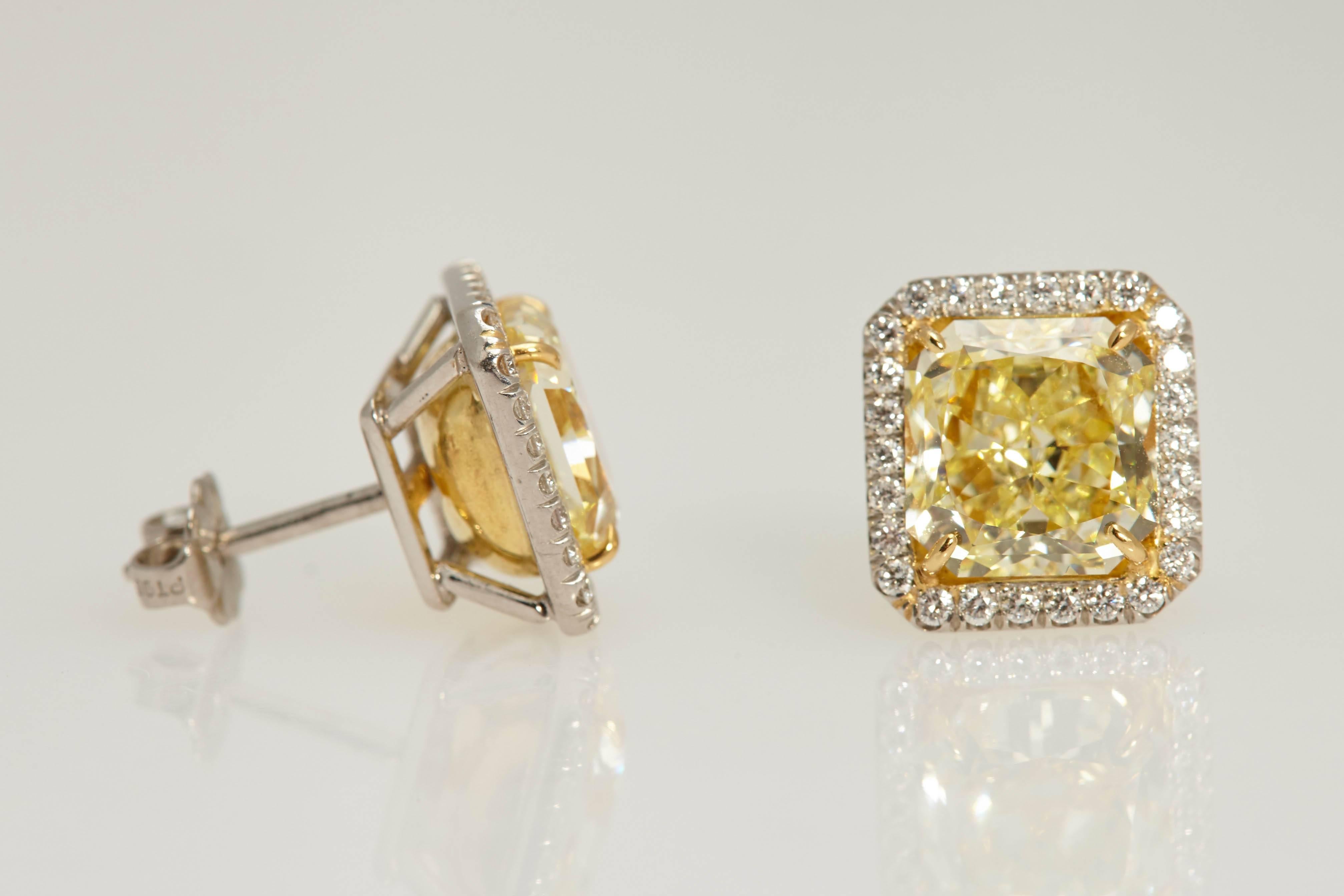 Modern Radiant GIA Fancy Yellow Diamond Earrings 6.61 Carat For Sale